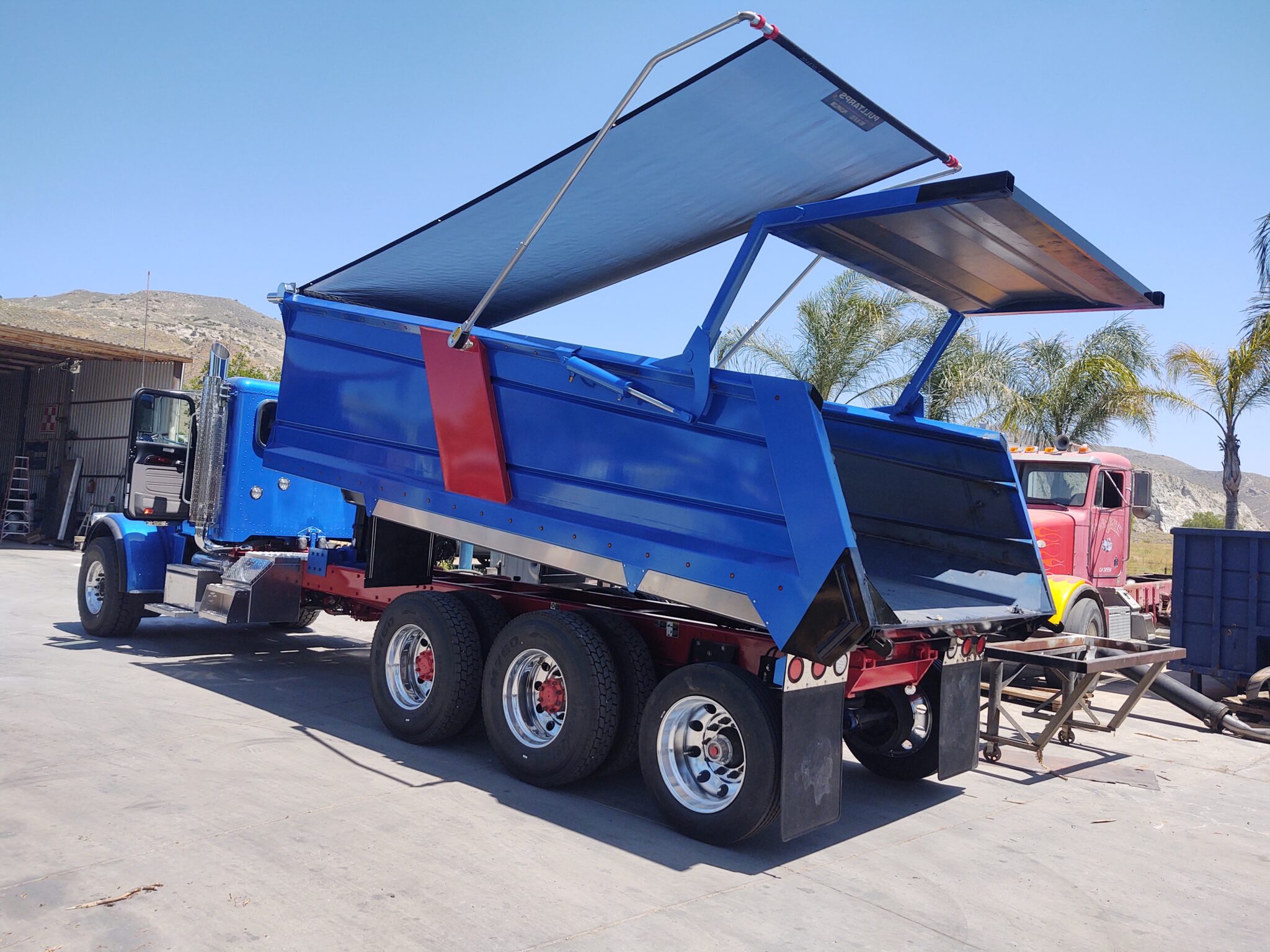 The Benefits of Using Mesh Tarps on Dump Trucks and Trailers